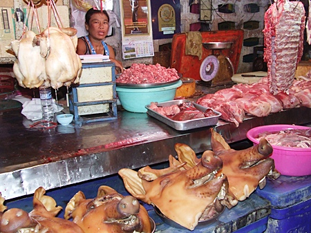 Meat vendor Niwat Paokem said pig heads were especially popular this year.